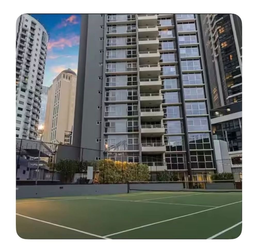 Tennis court in the grounds of the building