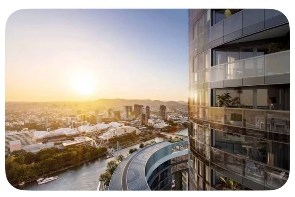 Sunset over the river and the city from the building